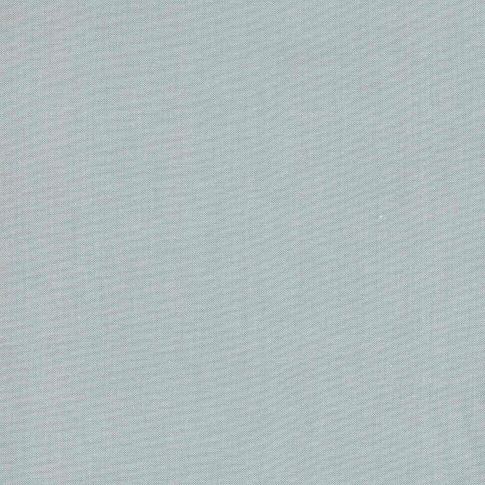 Close-up of light blue denim-like fabric texture with a fine weave.