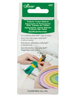 Packaging for Clover Fabric Tube Maker, a tool for making Jelly Roll rugs; shows hands sewing a fabric tube and a rainbow jelly roll.