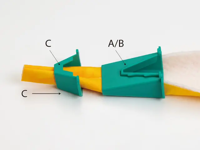 Teal plastic clamp on a yellow strap, showing labeled parts C and A/B with a clip mechanism.